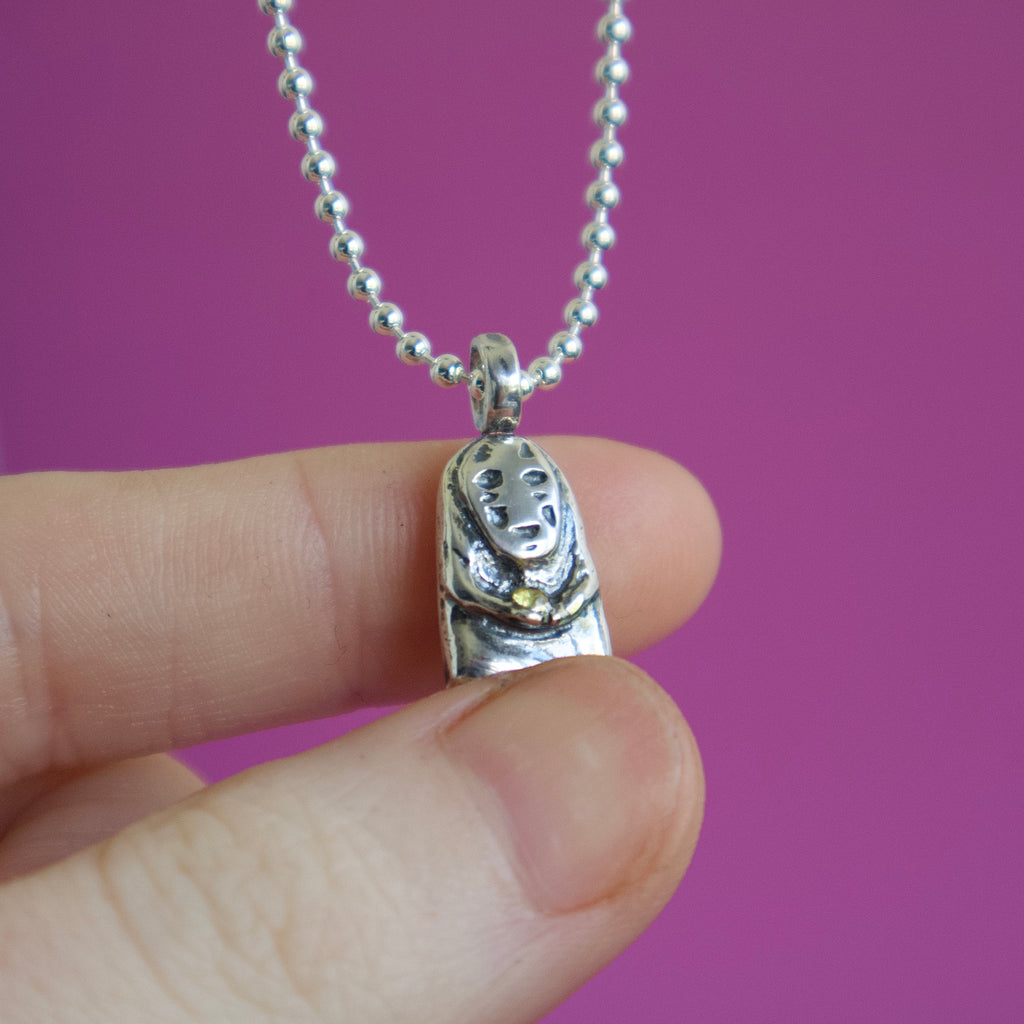 No Face Pendant