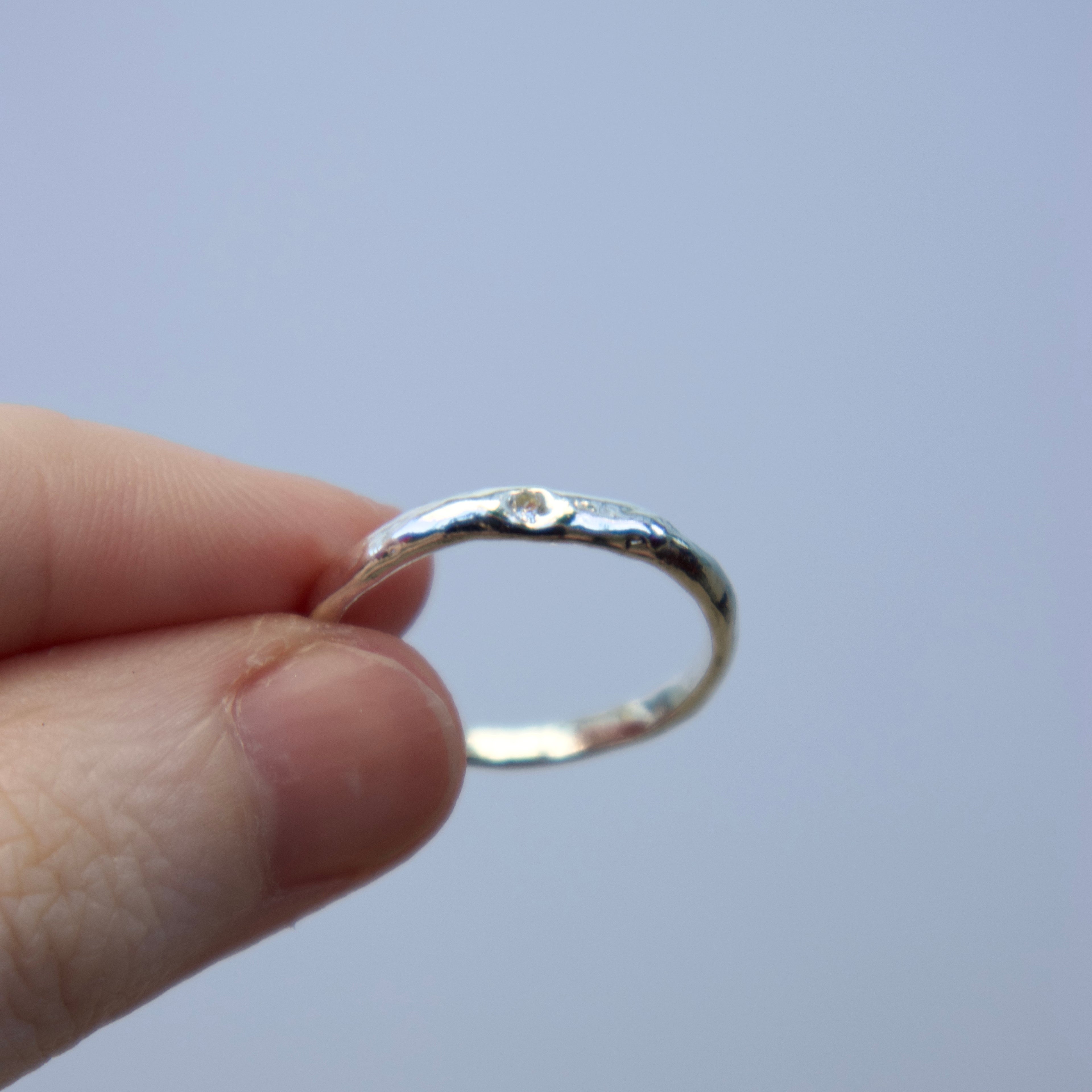 Sterling silver Candy Stacker Ring with lab-grown white sapphire. alternative fine jewellery handmade by Billy Tooth in Auckland, New Zealand.